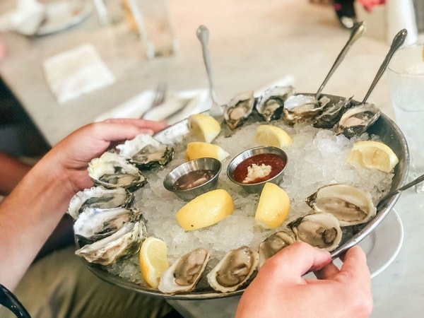 oysters with sauce and lemon