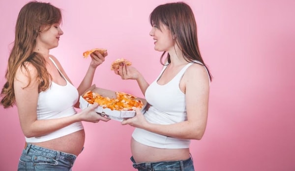 two pregnant women