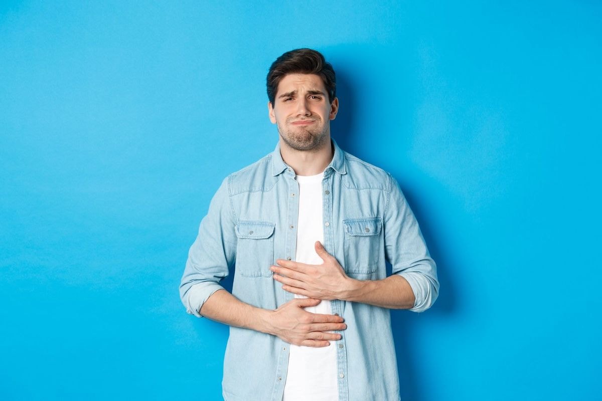 Man In Stomach Pain