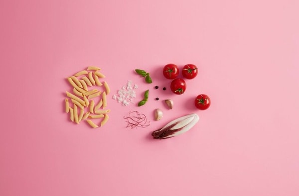 healthy foods in pink background