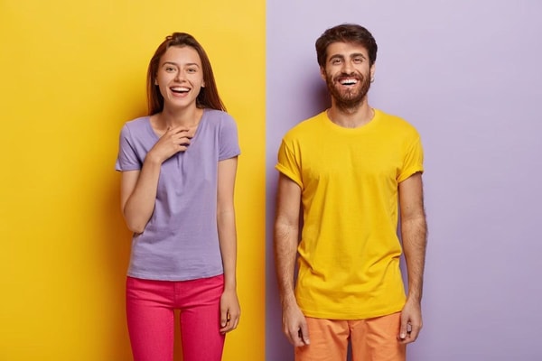 man and woman smiling