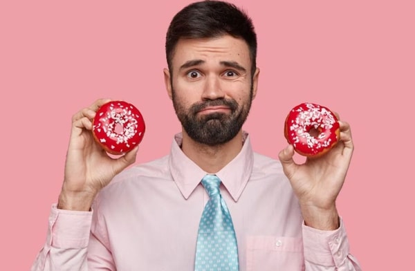 man considering about health benefits of donuts
