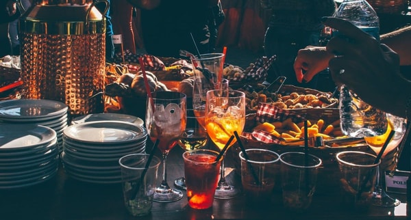 party table with foods and drinks