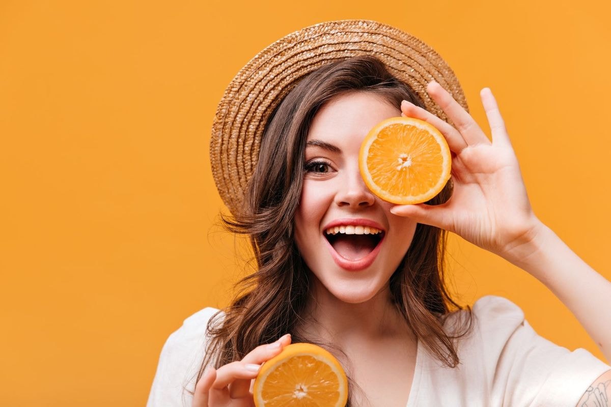 Woman With Oranges
