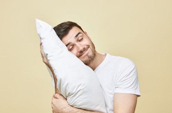 man laying on the pillow
